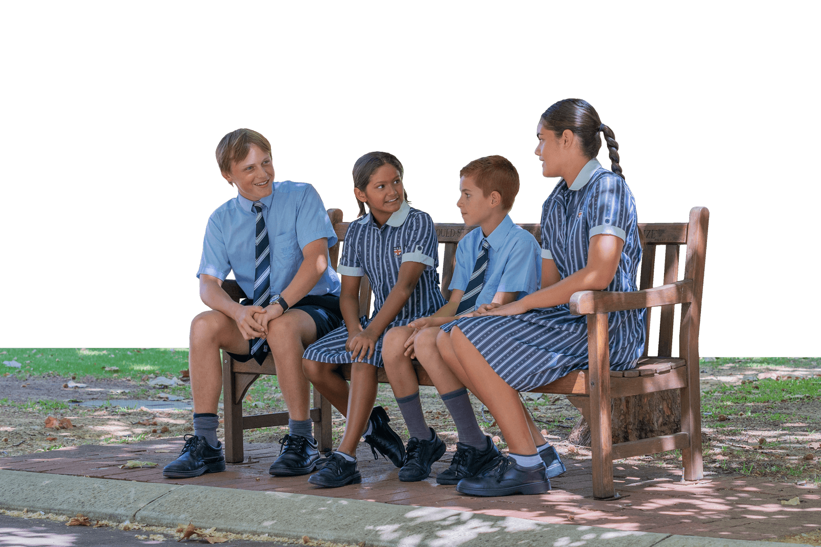 4 Guildford Grammar School students sitting next to each other on a School bench.