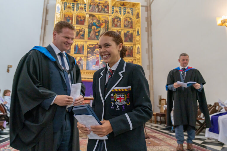 Guilford Grammar School student receiving Co-Captain leadership role during Prefect Induction